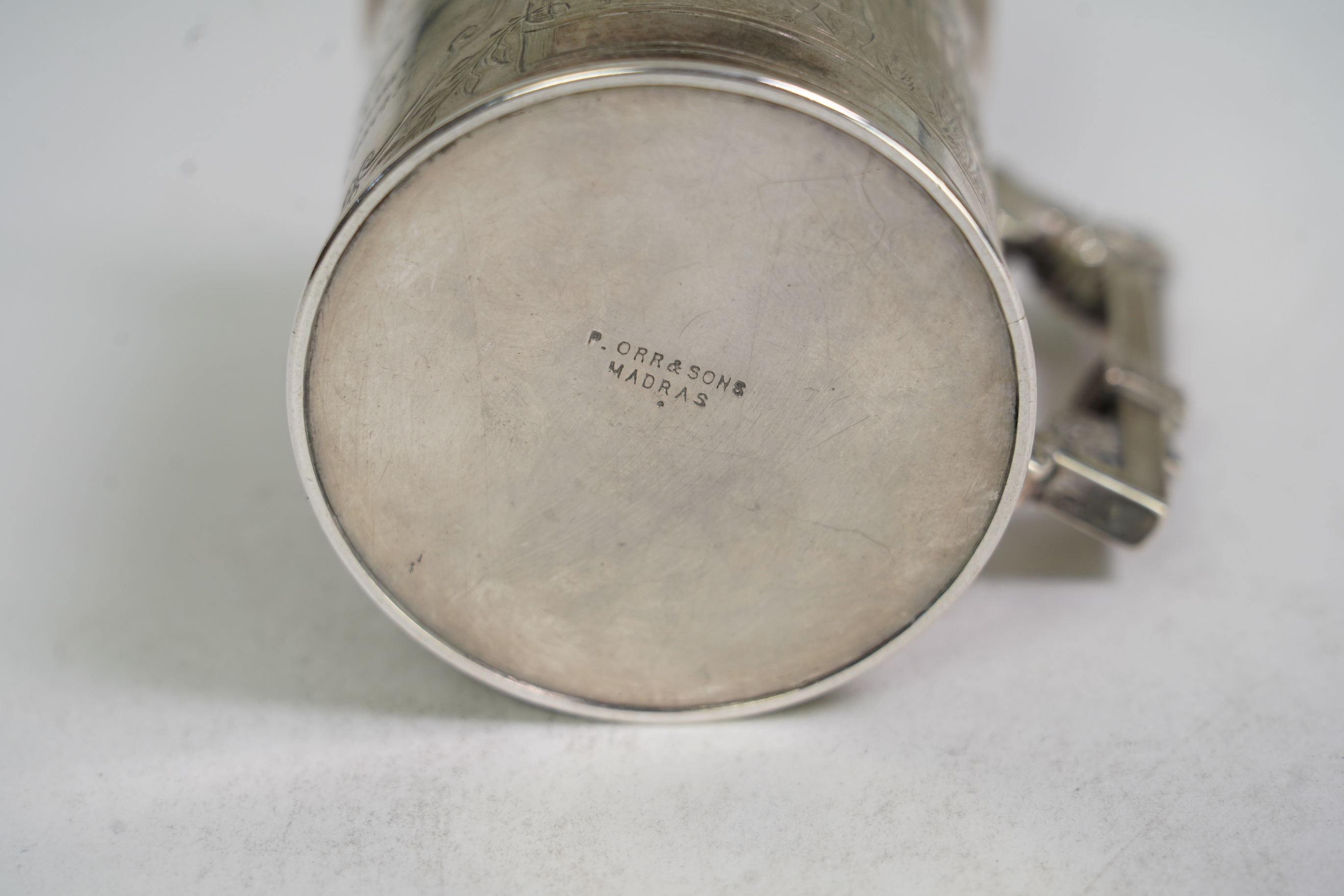A 19th century Indian colonial white metal christening mug, by P. Orr & Sons, Madras